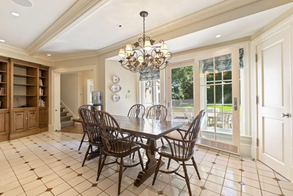 17 Clark Road Wellesley, MA 02481 - Photo 14 of 42 a view of a dining room with furniture and chandelier