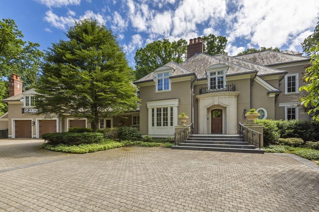 17 Clark Road Wellesley, MA 02481 - Photo 3 of 42 a front view of a house with a garden