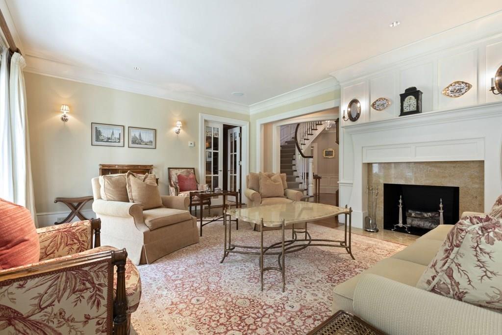 17 Clark Road Wellesley, MA 02481 - Photo 7 of 42 a living room with furniture and a fireplace