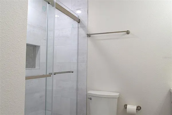 a bathroom with a sink toilet and vanity