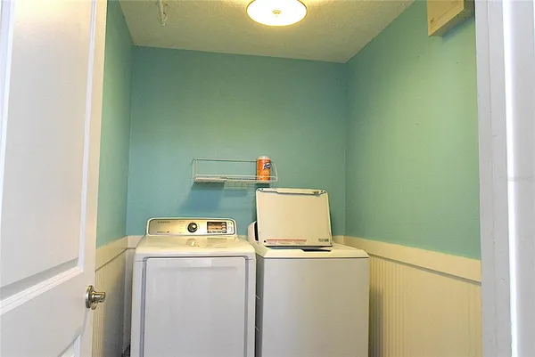 a view of empty room with windows