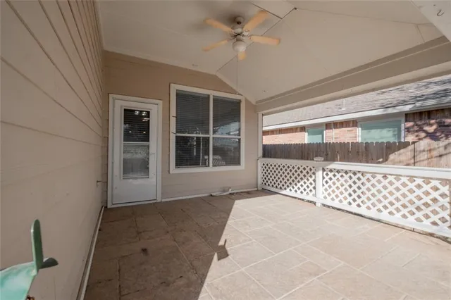 a kitchen with stainless steel appliances granite countertop a refrigerator a sink a stove and oven