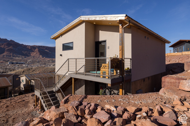1185 South Murphy Lane, Unit 301B Moab, UT 84532 - Photo 1 of 1 Rear view of property featuring a mountain view