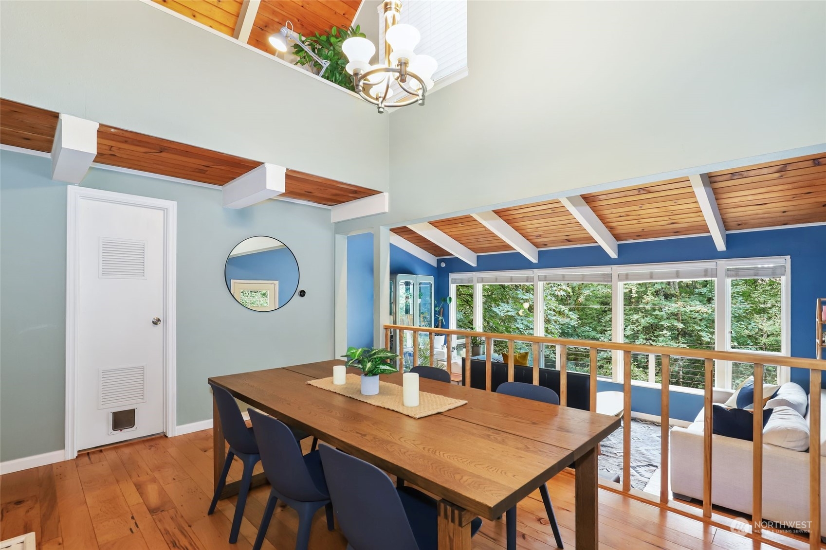 14630 200th Avenue Southeast Renton, WA 98059 - Photo 13 of 40 a view of a dining room with furniture window and wooden floor
