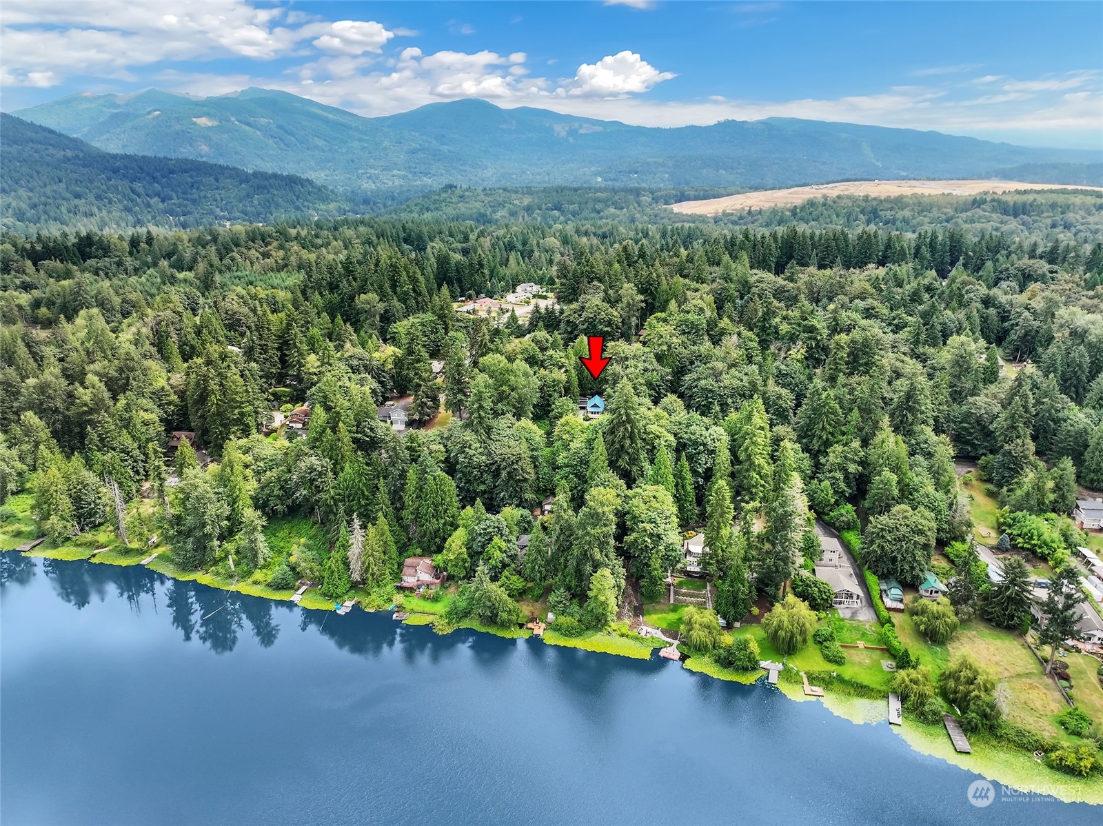 14630 200th Avenue Southeast Renton, WA 98059 - Photo 3 of 40 a view of a lake with a mountain in the background