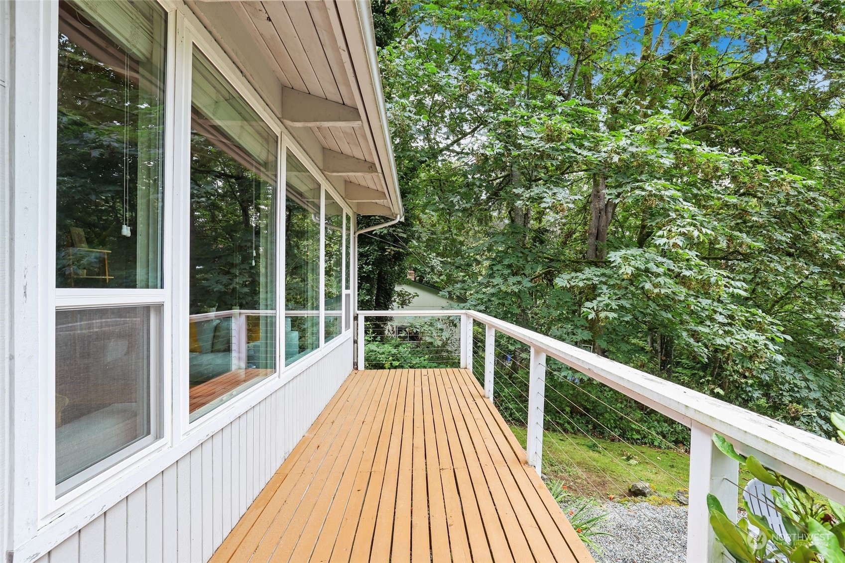 14630 200th Avenue Southeast Renton, WA 98059 - Photo 33 of 40 a view of balcony with wooden floor and fence