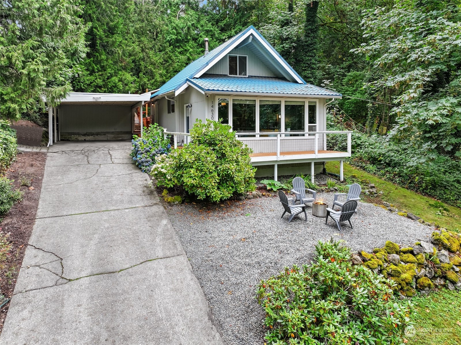 14630 200th Avenue Southeast Renton, WA 98059 - Photo 39 of 40 a view of a house with a yard and sitting area