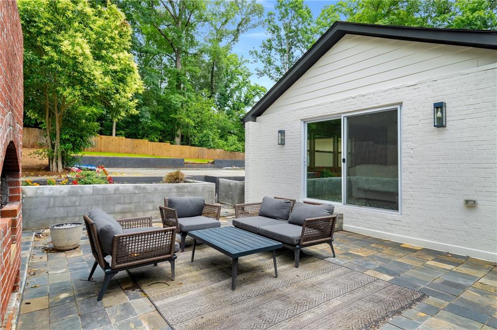 3154 North Druid Hills Road Northeast Decatur, GA 30033 - Photo 18 of 84 a backyard of a house with outdoor seating
