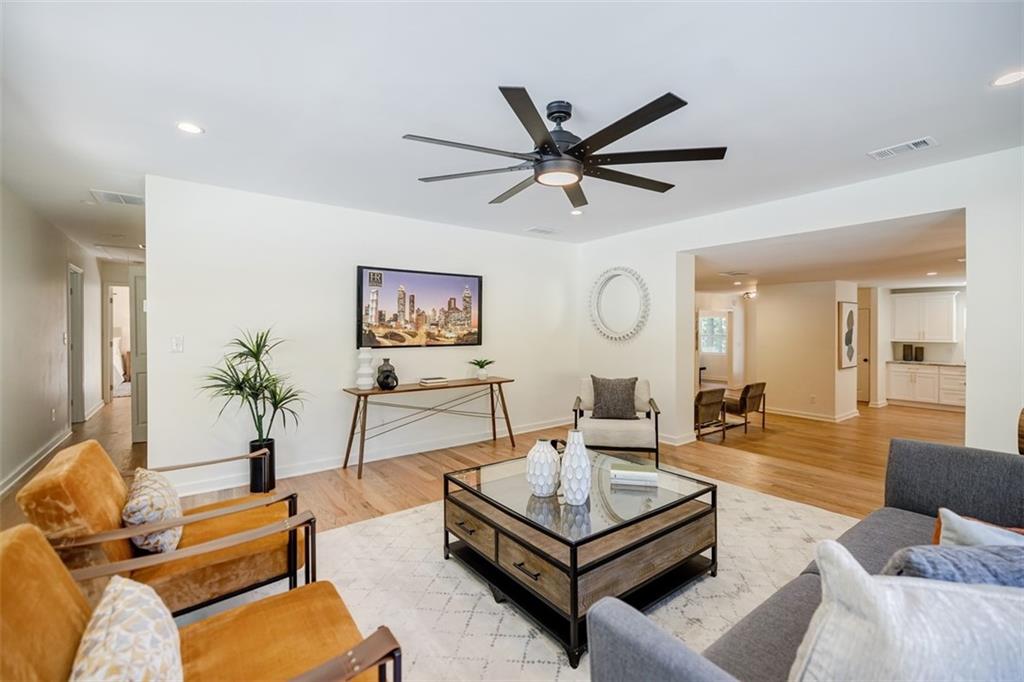 3154 North Druid Hills Road Northeast Decatur, GA 30033 - Photo 47 of 84 a living room with furniture and a large window