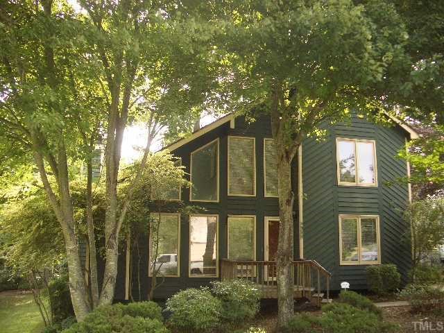 4304 Knightsbridge Way Raleigh, NC 27604 - Photo 1 of 12 a front view of a house with a garden
