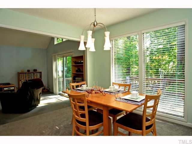 4304 Knightsbridge Way Raleigh, NC 27604 - Photo 3 of 12 a view of a dining room with furniture window and outside view