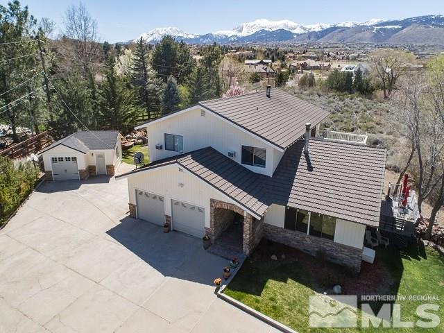 1435 Celese Lane Reno, NV 89511 - Photo 1 of 40 a aerial view of a house with a yard