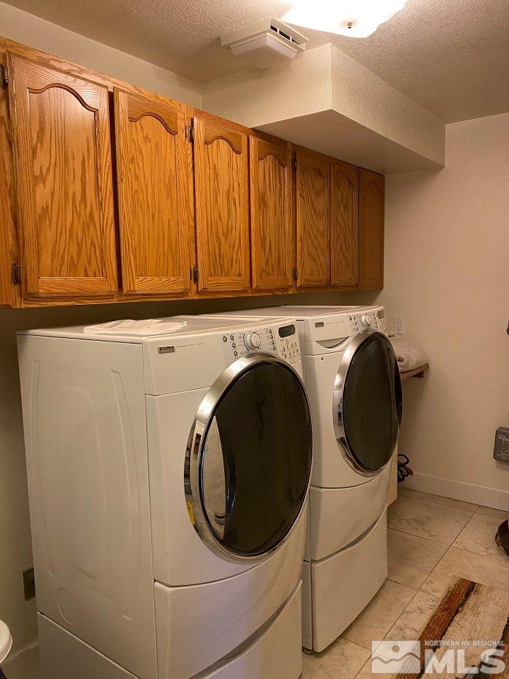1435 Celese Lane Reno, NV 89511 - Photo 20 of 40 a utility room with dryer and washer