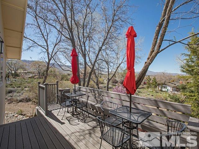1435 Celese Lane Reno, NV 89511 - Photo 26 of 40 a view of a chairs and table on the wooden floor
