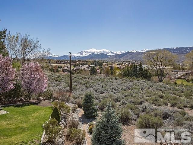 1435 Celese Lane Reno, NV 89511 - Photo 28 of 40 a view of a lake with mountains in the background