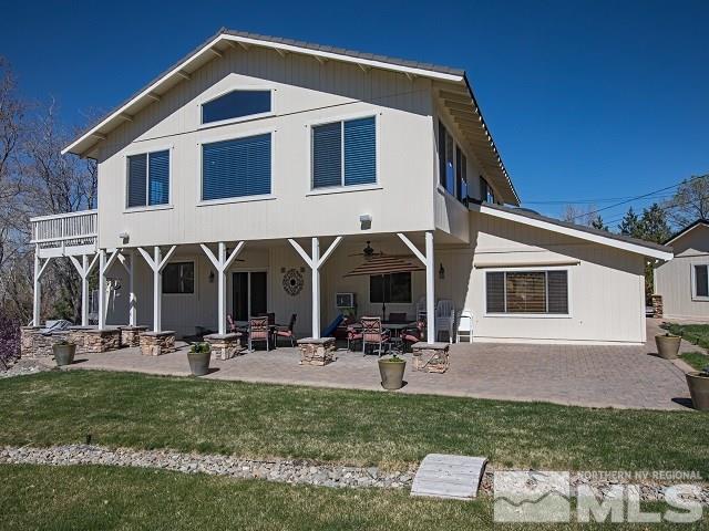 1435 Celese Lane Reno, NV 89511 - Photo 38 of 40 a front view of house with outdoor seating