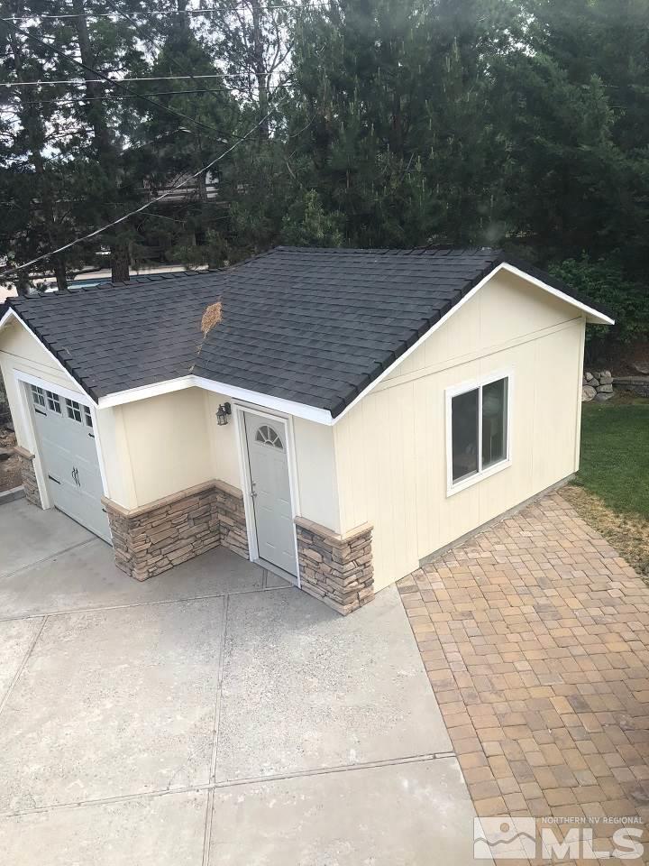 1435 Celese Lane Reno, NV 89511 - Photo 39 of 40 a view of a house with a yard