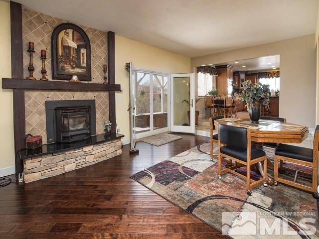 1435 Celese Lane Reno, NV 89511 - Photo 5 of 40 a living room with furniture and a fireplace
