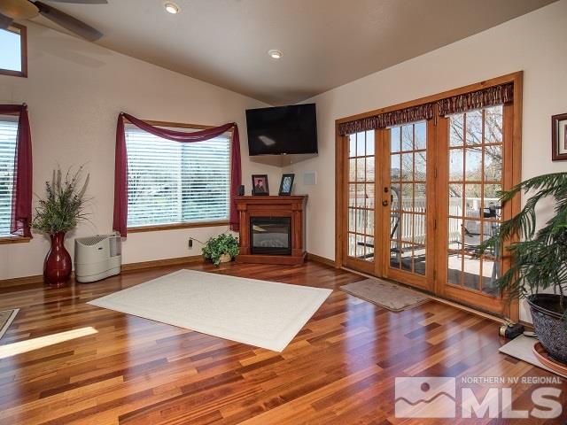 1435 Celese Lane Reno, NV 89511 - Photo 6 of 40 a living room with furniture fireplace and flat screen tv