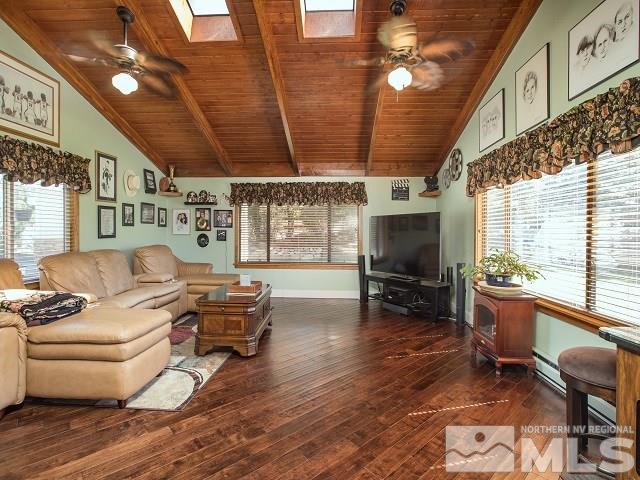 1435 Celese Lane Reno, NV 89511 - Photo 7 of 40 a living room with furniture and a flat screen tv