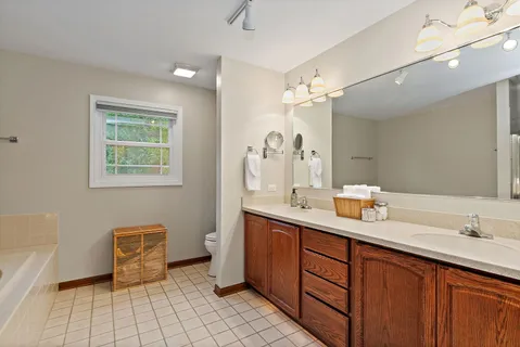 a white bath tub sitting in a bathroom