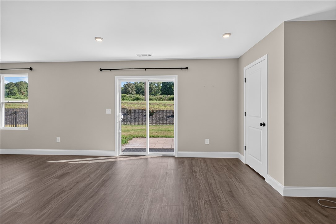 2007 Aberdeen Lane Walhalla, SC 29691 - Photo 13 of 41 Sliding glass doors open to a backyard oasis, enhancing indoor-outdoor living.