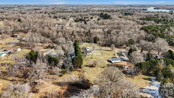an aerial view of residential house with parking space