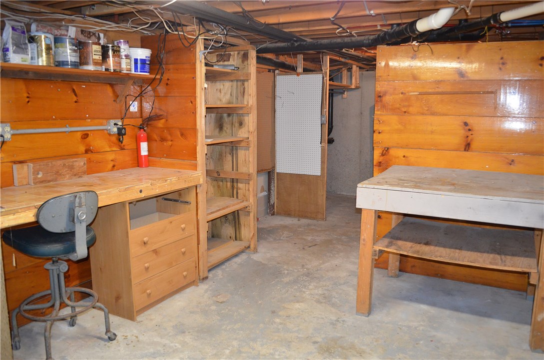 22 Weaver Hill Road Coventry, RI 02816 - Photo 37 of 41 Basement workshop with access to the outside