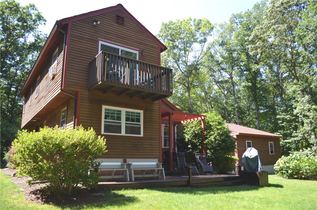 22 Weaver Hill Road Coventry, RI 02816 - Photo 39 of 41 Back view with private deck and even a cut out for the bbq
