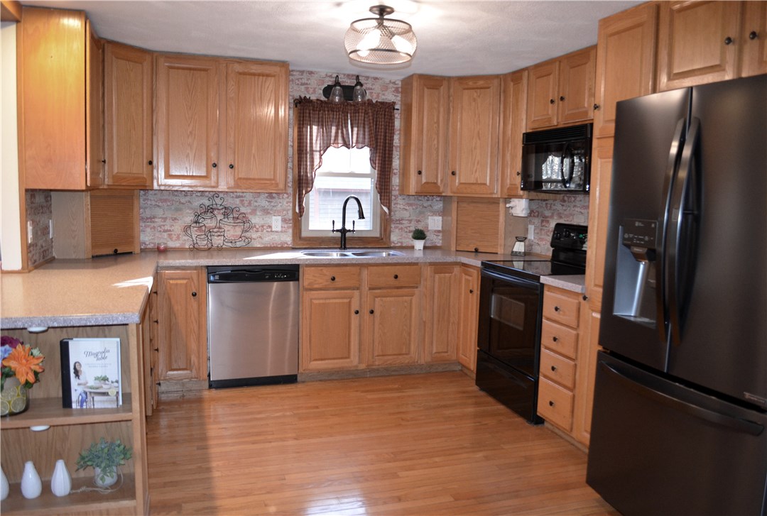 22 Weaver Hill Road Coventry, RI 02816 - Photo 6 of 41 Kitchen with new fridge!