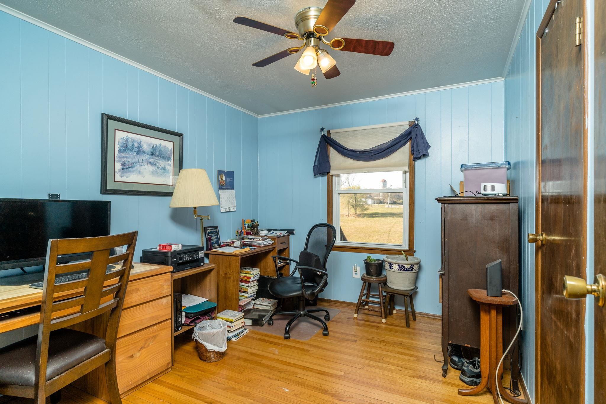 3154 Layman Trestle Road Harrisonburg, VA 22802 - Photo 12 of 30 a view of a workspace with furniture and a window
