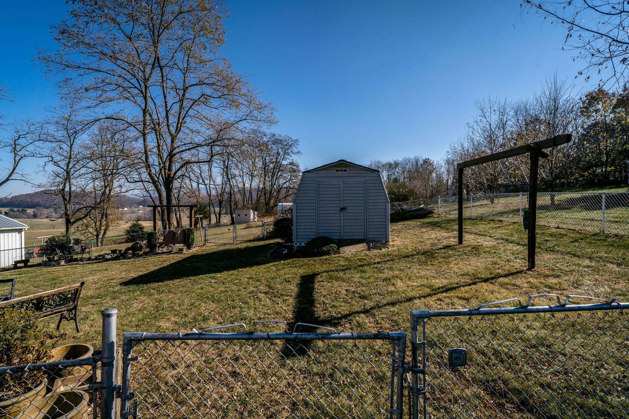3154 Layman Trestle Road Harrisonburg, VA 22802 - Photo 16 of 30 a view of backyard with wooden fence