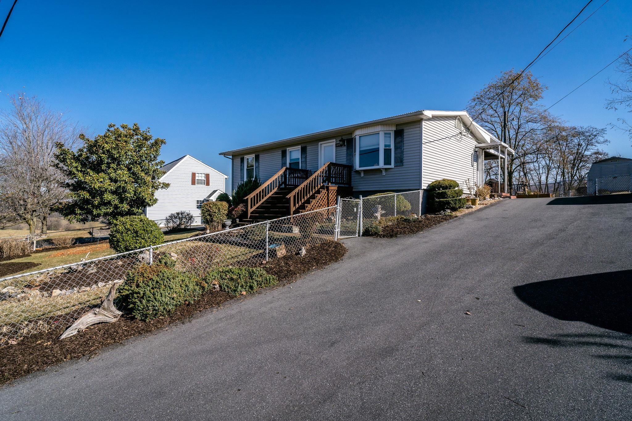 3154 Layman Trestle Road Harrisonburg, VA 22802 - Photo 2 of 30 a view of a house with a yard