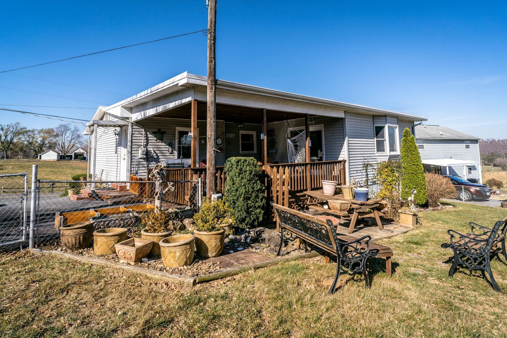 3154 Layman Trestle Road Harrisonburg, VA 22802 - Photo 21 of 30 a view of a lounge chairs in the patio