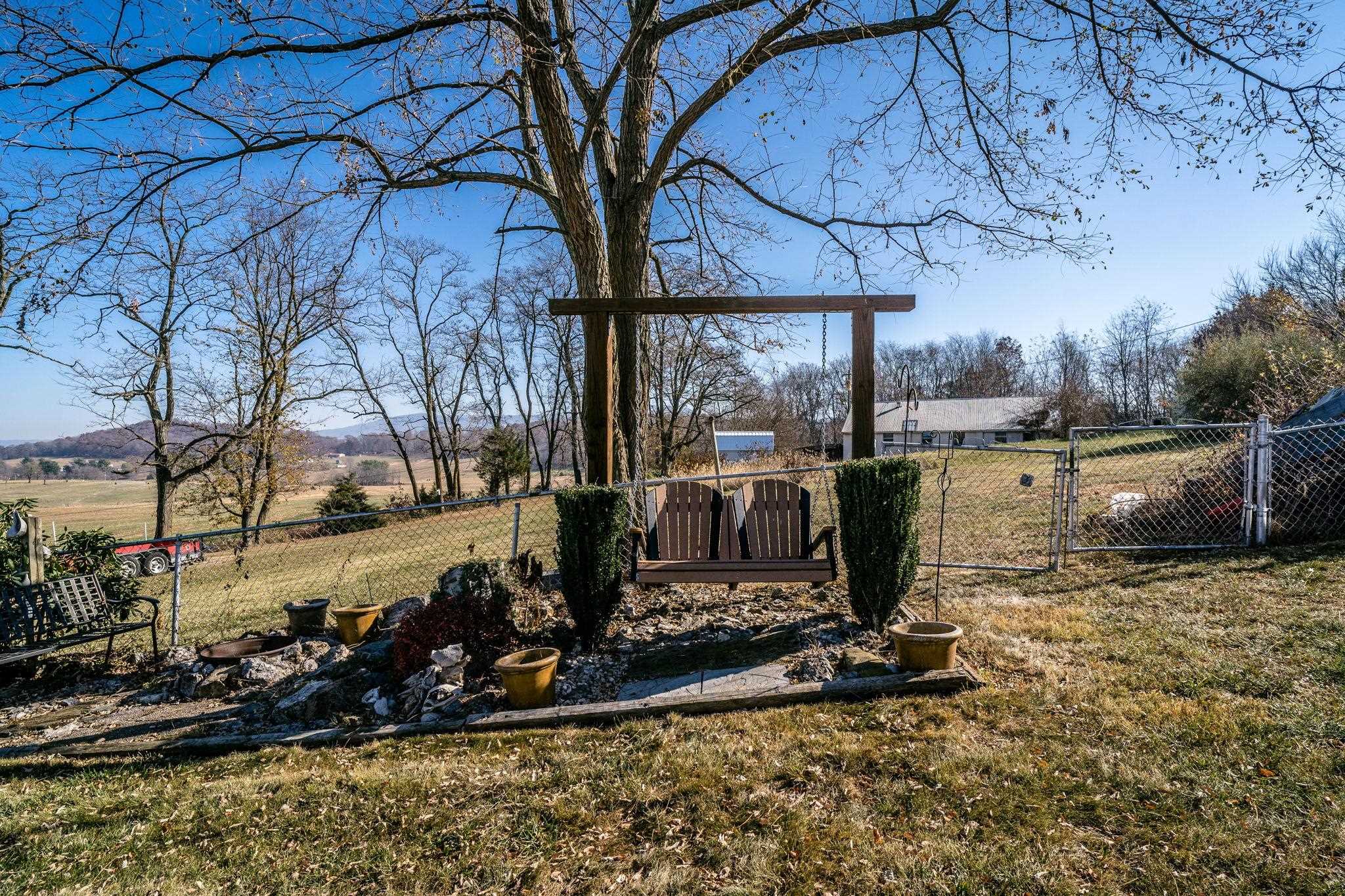 3154 Layman Trestle Road Harrisonburg, VA 22802 - Photo 22 of 30 a view of a backyard with wooden fence