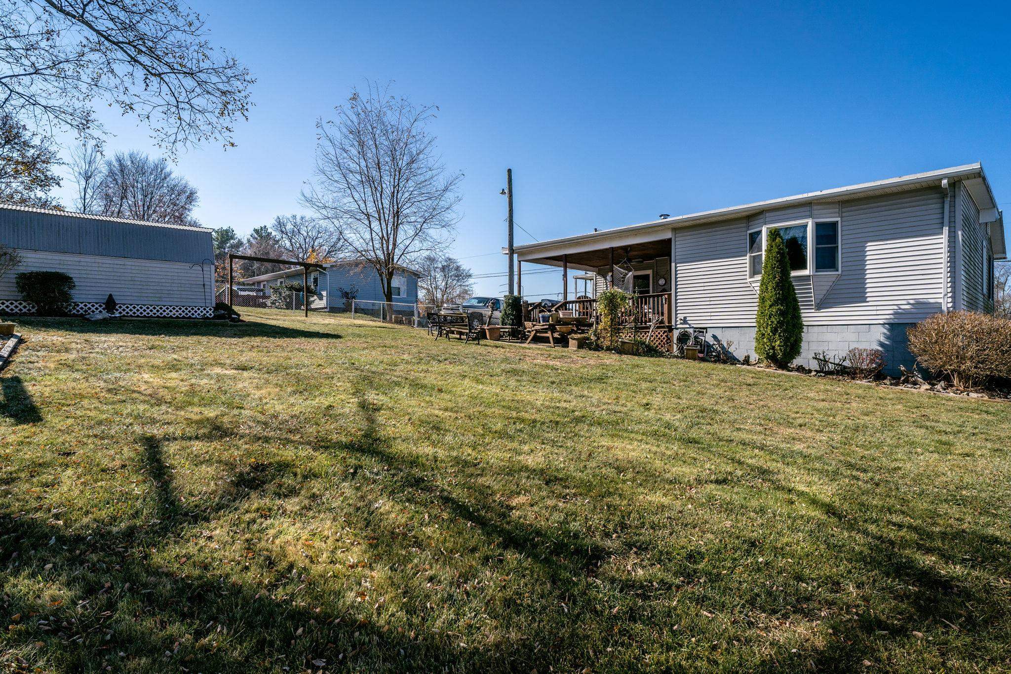 3154 Layman Trestle Road Harrisonburg, VA 22802 - Photo 23 of 30 a view of a house with a yard