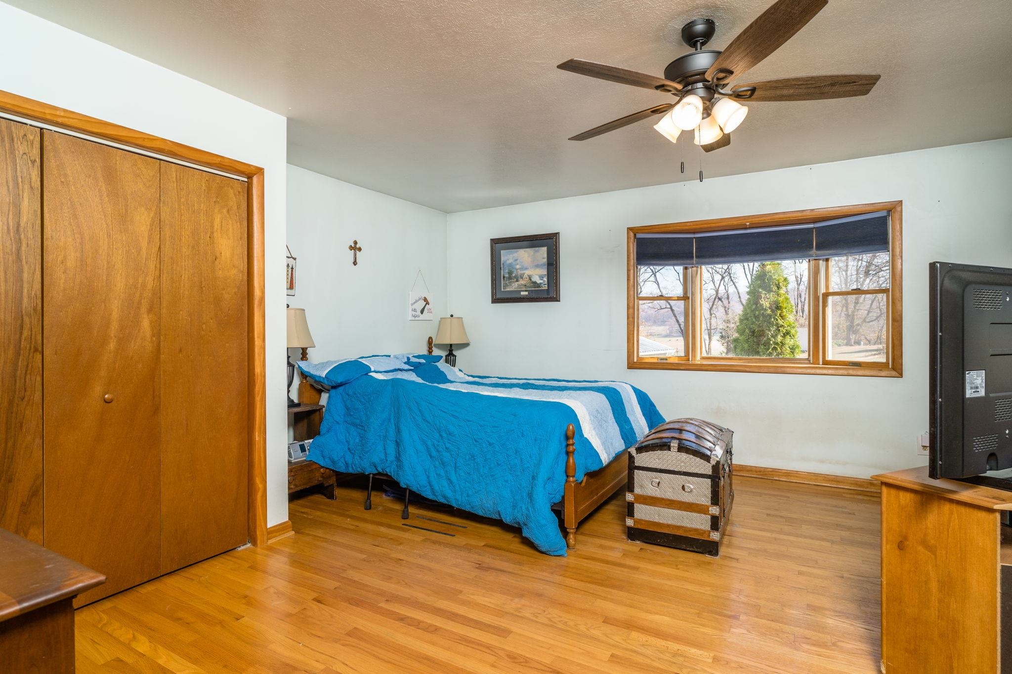 3154 Layman Trestle Road Harrisonburg, VA 22802 - Photo 8 of 30 a bedroom with a bed and a window