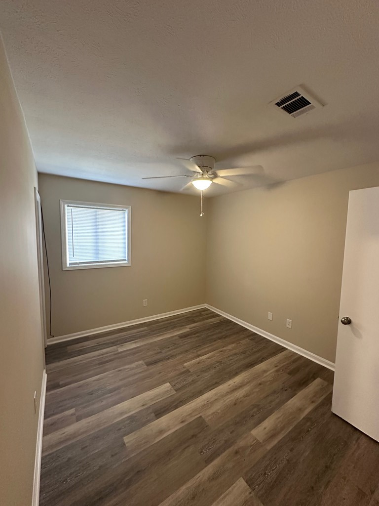 4135 Forrest Road Columbus, GA 31907 - Photo 11 of 15 a view of empty room with wooden floor