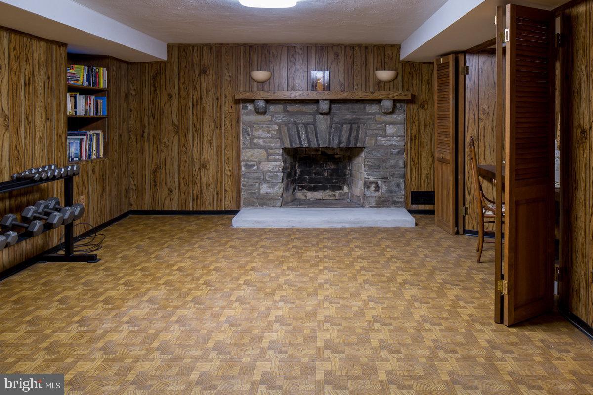 218 Fairview Road Narberth, PA 19072 - Photo 27 of 31 Finished Lower Level with Fireplace