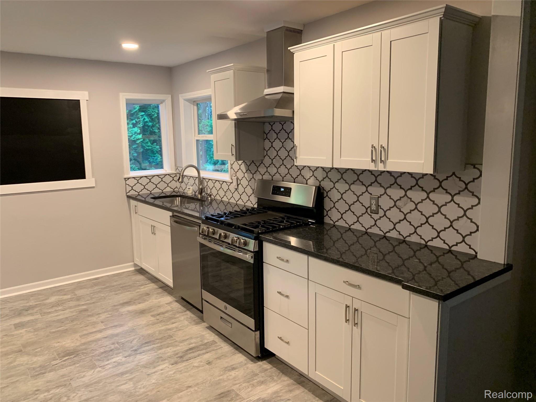 4859 Crooked Lake Road Howell, MI 48843 - Photo 5 of 90 Brand New kitchen, New Appliances (included) New Cabinets, Granite Countertops, flooring and backsplash just installed!