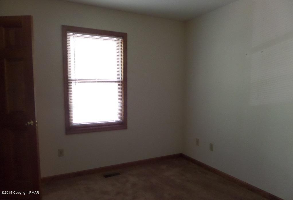 280 Pin Oak Road Stroudsburg, PA 18360 - Photo 11 of 14 an empty room with a window