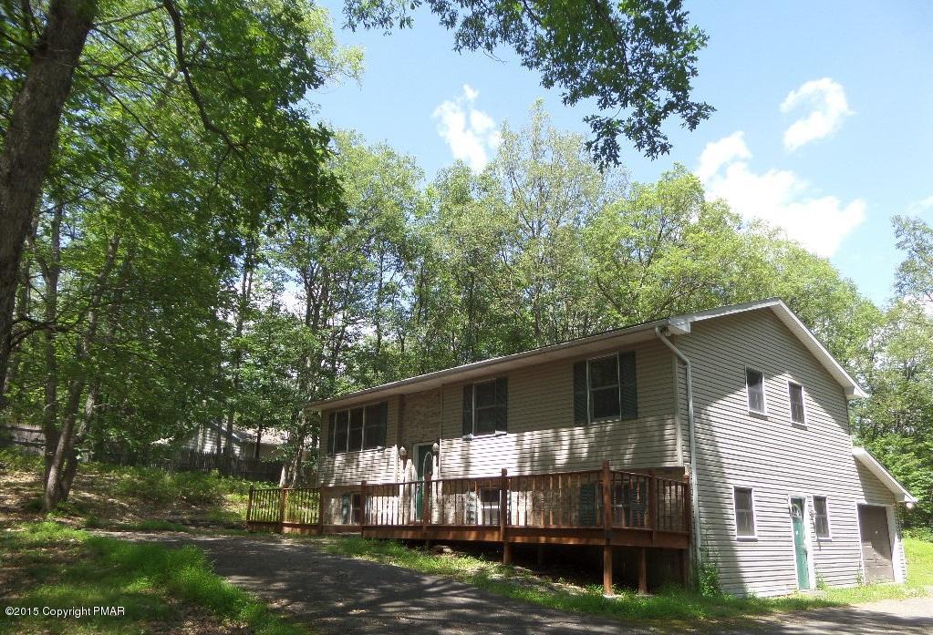 280 Pin Oak Road Stroudsburg, PA 18360 - Photo 2 of 14 a front view of a house with garden