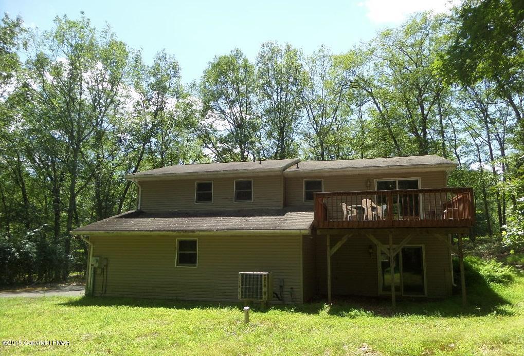 280 Pin Oak Road Stroudsburg, PA 18360 - Photo 4 of 14 a front view of a house with a yard