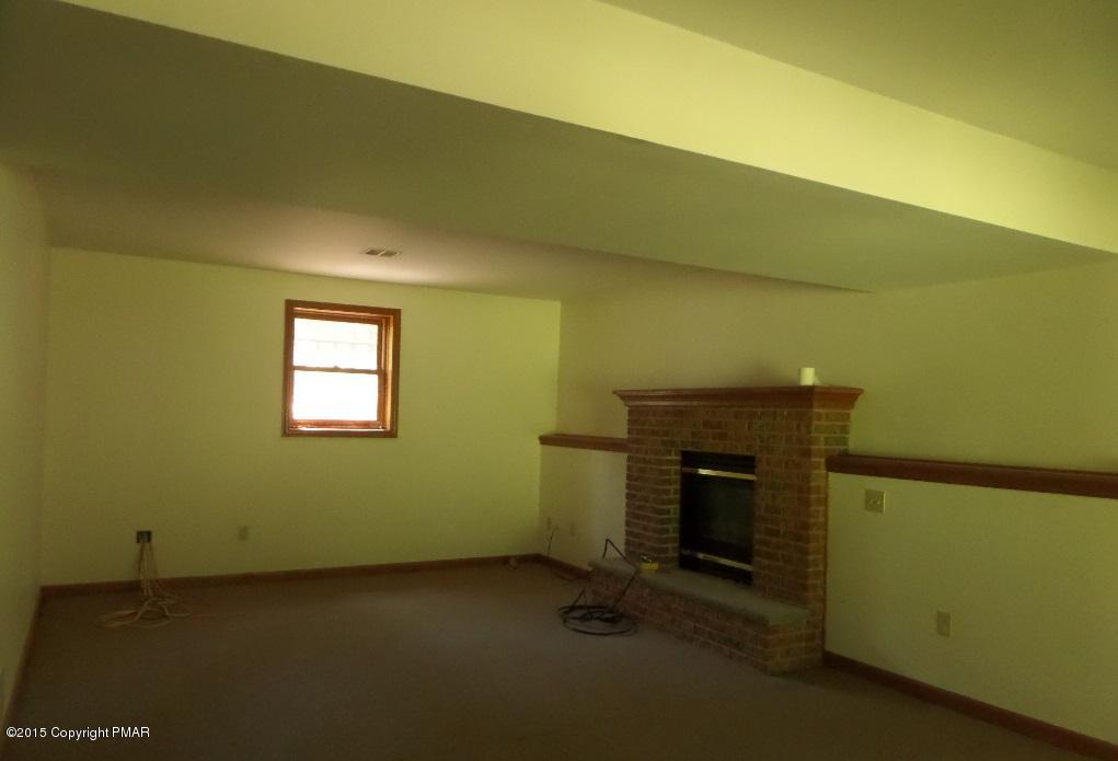 280 Pin Oak Road Stroudsburg, PA 18360 - Photo 5 of 14 a view of a livingroom with a fireplace