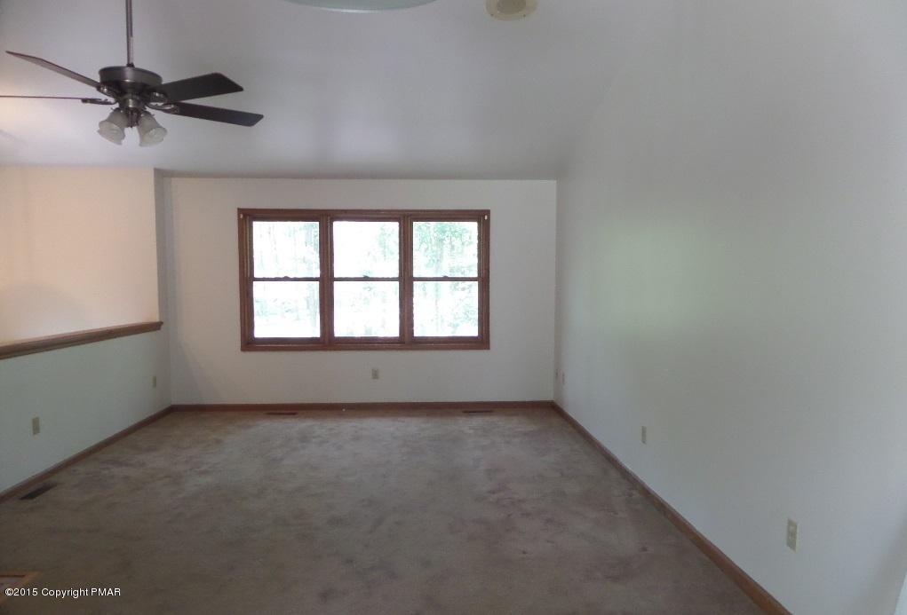 280 Pin Oak Road Stroudsburg, PA 18360 - Photo 9 of 14 an empty room with a window