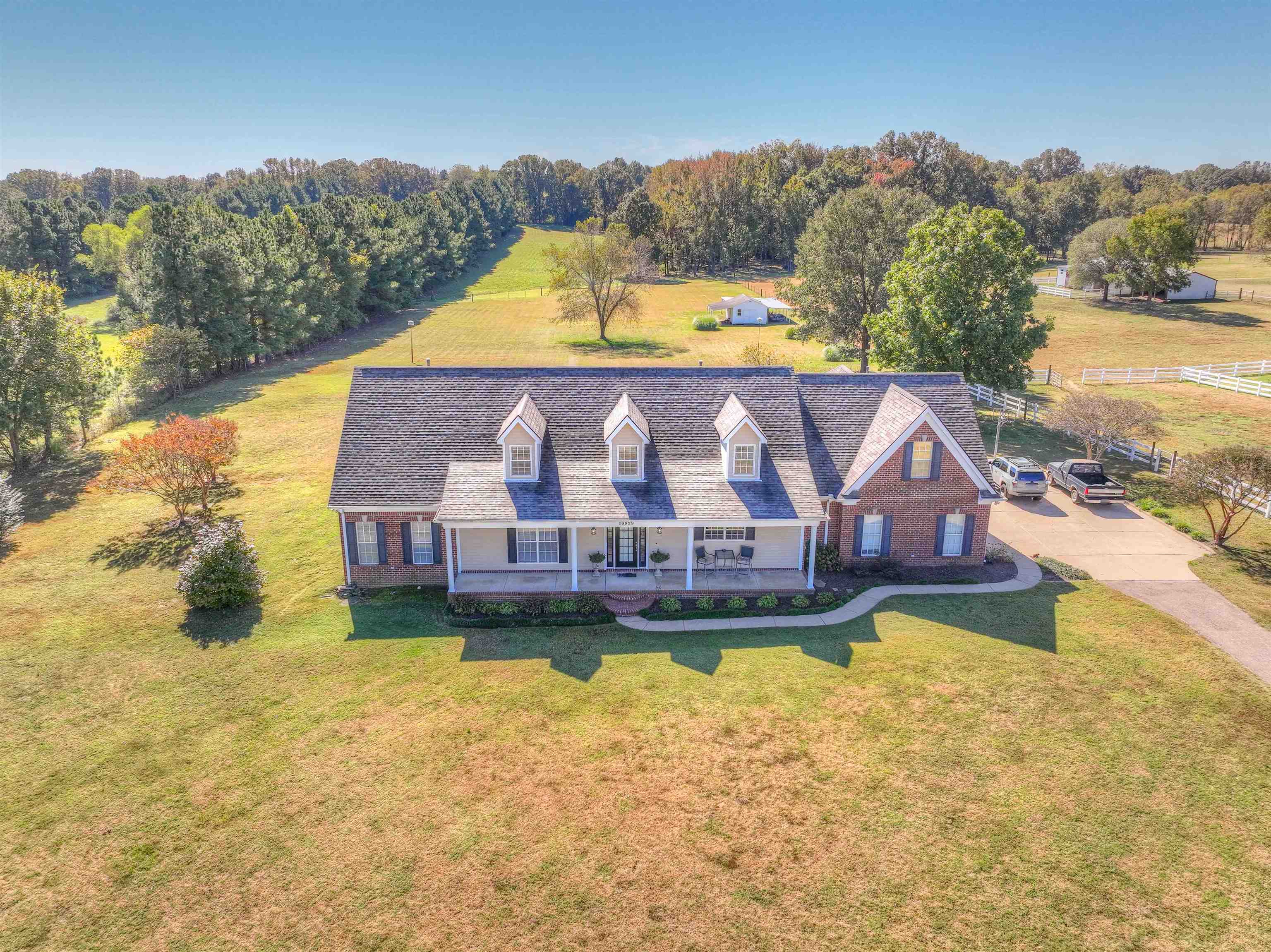 10529 Moose Road Millington, TN 38053 - Photo 1 of 40 a view of a swimming pool and lounge chairs
