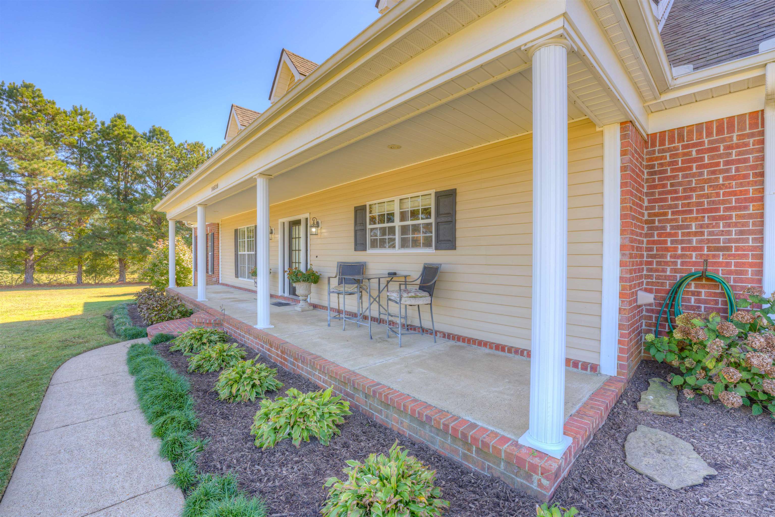 10529 Moose Road Millington, TN 38053 - Photo 14 of 40 a front view of a house with a yard