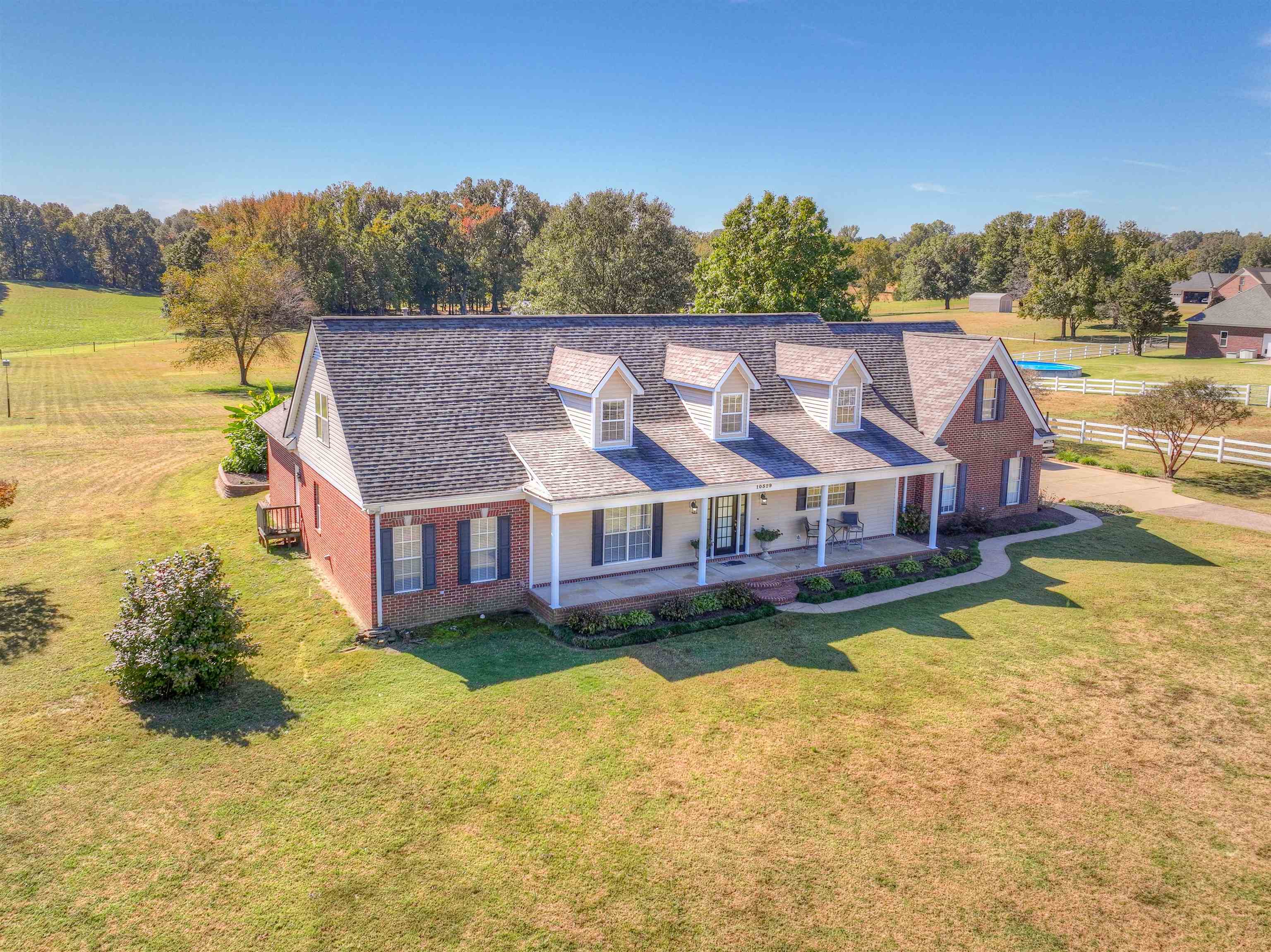 10529 Moose Road Millington, TN 38053 - Photo 2 of 40 an aerial view of a house with a big yard