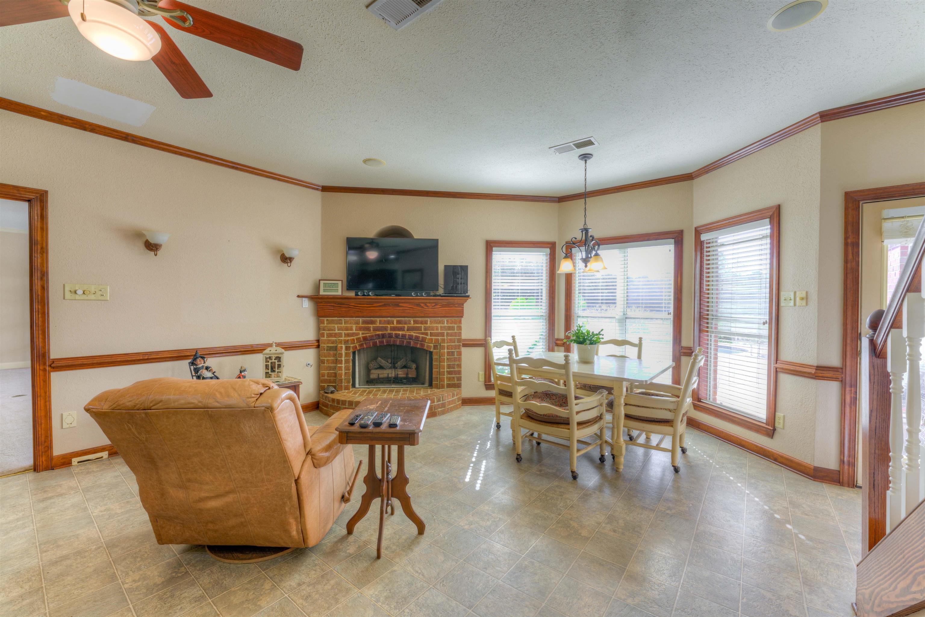 10529 Moose Road Millington, TN 38053 - Photo 22 of 40 a living room with furniture and a fireplace
