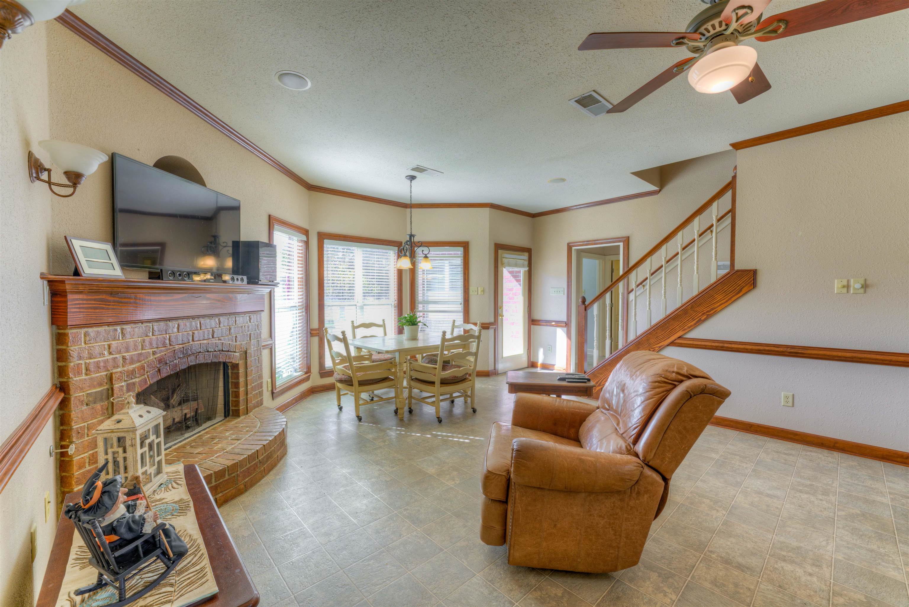 10529 Moose Road Millington, TN 38053 - Photo 23 of 40 a living room with furniture fireplace and a flat screen tv